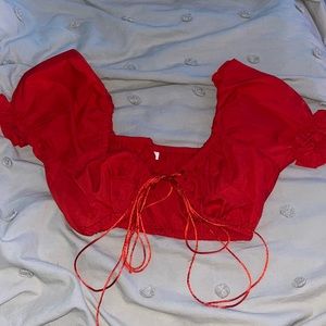 red cropped tie top with puffer sleeves